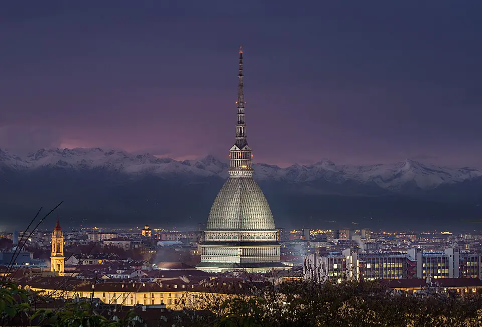 The Mole Antonelliana against the Alps at dusk, Turin